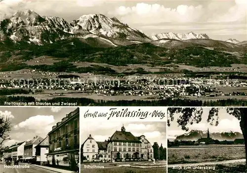 AK / Ansichtskarte Freilassing Panorama mit Staufen und Zwiesel Untersberg Hauptstrasse Schulhaus Kat. Freilassing