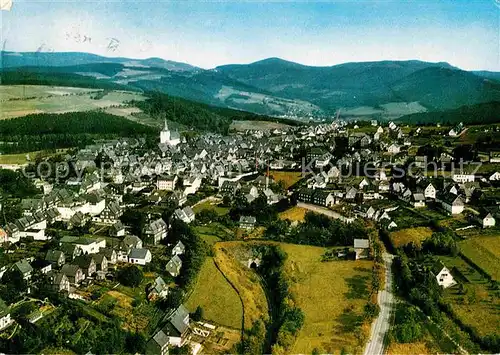 AK / Ansichtskarte Winterberg Hochsauerland Heilklimatischer Kurort und Wintersportplatz Fliegeraufnahme Kat. Winterberg