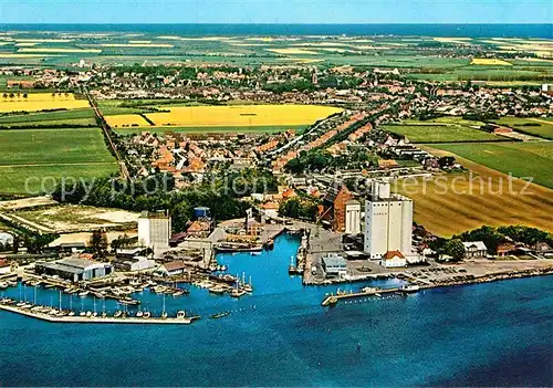 AK / Ansichtskarte Insel Fehmarn Ostseebad Burg und Hafen von Burgstaaken Fliegeraufnahme Kat. Fehmarn