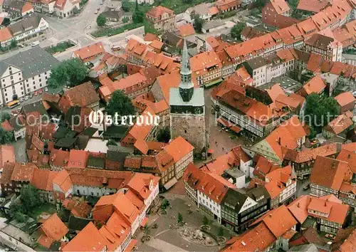 AK / Ansichtskarte Osterode Harz St Aegidienkirche Martin Luther Platz Kornmarkt Fliegeraufnahme Kat. Osterode am Harz