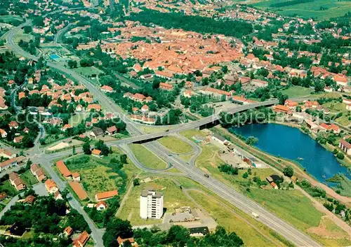 AK / Ansichtskarte Osterode Harz Blick ueber den Nordhang zur malerischen Stadt Fliegeraufnahme Kat. Osterode am Harz