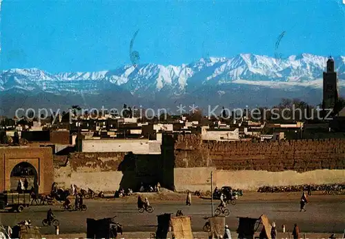 AK / Ansichtskarte Marrakech Marrakesch Stadtmauer mit Grossem Atlas Kat. Marokko