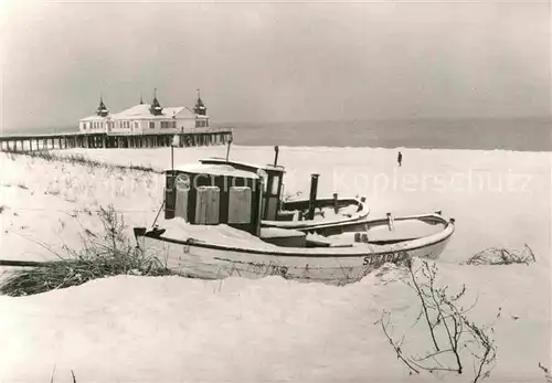 AK / Ansichtskarte Ahlbeck Ostseebad Winter an der Seebruecke Kat. Heringsdorf Insel Usedom