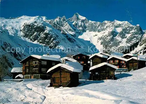 AK / Ansichtskarte Eggen Bellwald Bergdorf mit Wannenhorn Berner Alpen im Winter