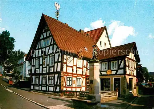 AK / Ansichtskarte Bad Orb Fachwerkhaus Wendelinusbrunnen Kat. Bad Orb