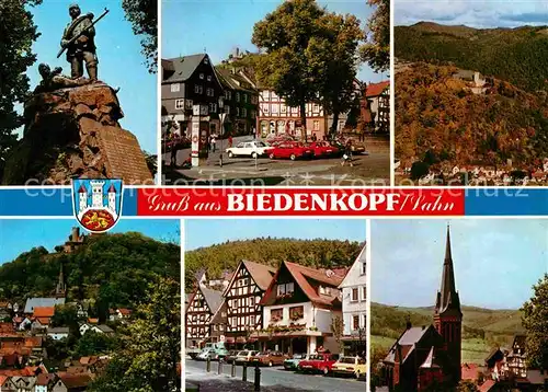 AK / Ansichtskarte Biedenkopf Denkmal Marktplatz Ortsansicht mit Kirche Schloss Fachwerkhaeuser Kat. Biedenkopf