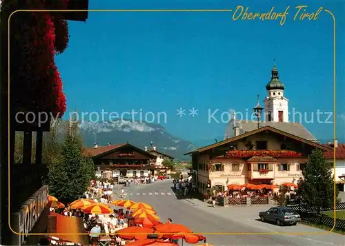 AK / Ansichtskarte Oberndorf Tirol Ortsmotiv an der Kirche Restaurant Terrasse Alpenblick Kat. Oberndorf in Tirol