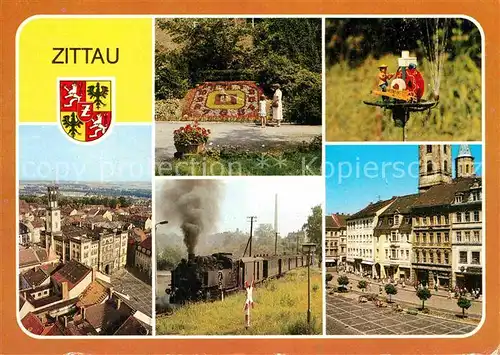 AK / Ansichtskarte Zittau Blumenuhr Schleifermaennelbrunnen Rathaus Schmalspurbahn Platz der Jugend Kat. Zittau