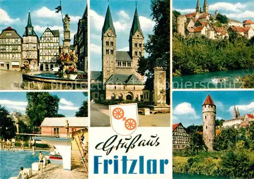 AK / Ansichtskarte Fritzlar Brunnen Fachwerk Kirche Freibad Turm Partie am Fluss Kat. Fritzlar