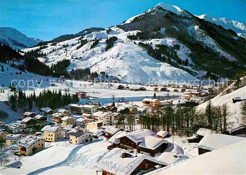 AK / Ansichtskarte Hinterglemm Saalbach Winterpanorama mit Zwoelferkogel Alpen
