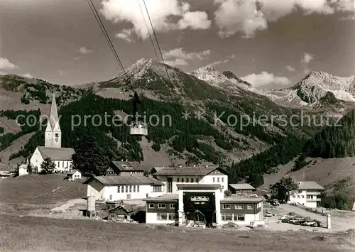 AK / Ansichtskarte Mittelberg Kleinwalsertal Walmendingerhornbahn Talstation Kirche Alpen Kat. Oesterreich