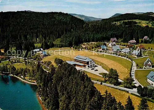 AK / Ansichtskarte Titisee Hotel Cafe Brugger am See Fliegeraufnahme Kat. Titisee Neustadt