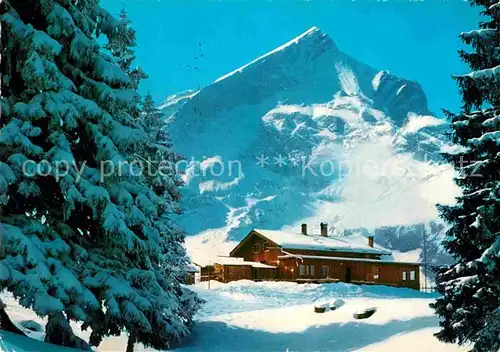 AK / Ansichtskarte Garmisch Partenkirchen Kreuzalm mit Alpspitze Winterpanorama Alpen Kat. Garmisch Partenkirchen