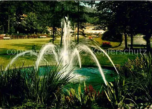 AK / Ansichtskarte Wildemann Springbrunnen mit Kurhaus Kat. Wildemann Harz