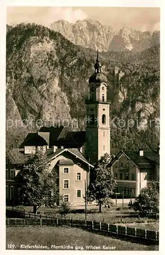 AK / Ansichtskarte Kiefersfelden Pfarrkirche gegen Wilden Kaiser Kat. Kiefersfelden