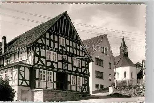 AK / Ansichtskarte Diedenshausen Wittgenstein Ortsansicht Fachwerkhaus Kirche Kat. Bad Berleburg