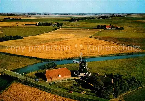 AK / Ansichtskarte Seriem Fliegeraufnahme mit Windmuehle Kat. Neuharlingersiel