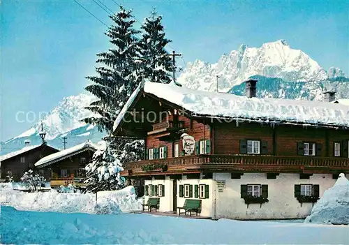 AK / Ansichtskarte St Johann Tirol Ortspartie im Winter gegen Wilden Kaiser Kat. St. Johann in Tirol