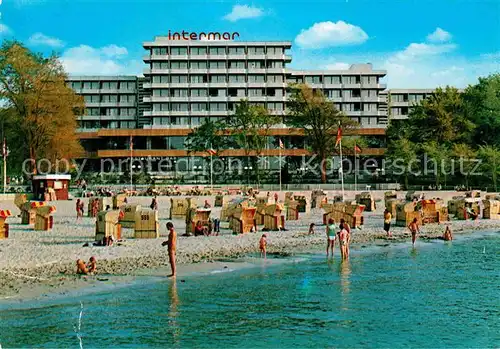 AK / Ansichtskarte Gluecksburg Ostseebad Strand mit Intermar Hotel Gluecksburg Kat. Gluecksburg (Ostsee)
