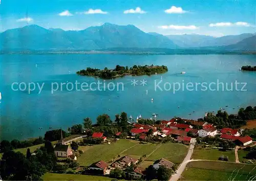 AK / Ansichtskarte Gstadt Chiemsee Fliegeraufnahme mit Fraueninsel Hochfelln und Hochgern Kat. Gstadt a.Chiemsee