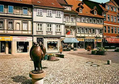 AK / Ansichtskarte Osterode Harz Bronce Skulptur am Markt Kat. Osterode am Harz