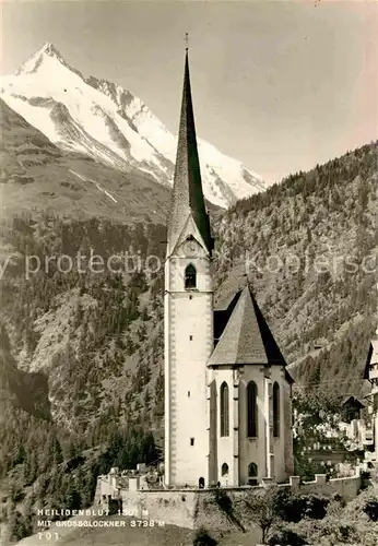 AK / Ansichtskarte Heiligenblut Kaernten Kirche Blick zum Grossglockner Hohe Tauern Kat. Heiligenblut