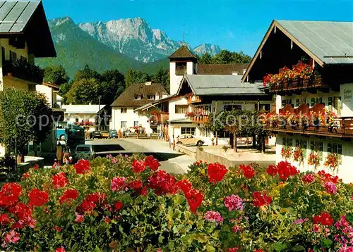 AK / Ansichtskarte Unterstein Schoenau Ortsmotiv mit Kirche Blumen Blick zum Untersberg Berchtesgadener Alpen