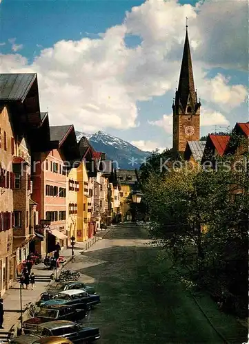 AK / Ansichtskarte Kitzbuehel Tirol Stadtplatz mit Kirche Kat. Kitzbuehel