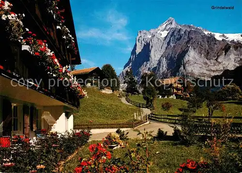 AK / Ansichtskarte Grindelwald Wohnhaeuser mit Wetterhorn Kat. Grindelwald