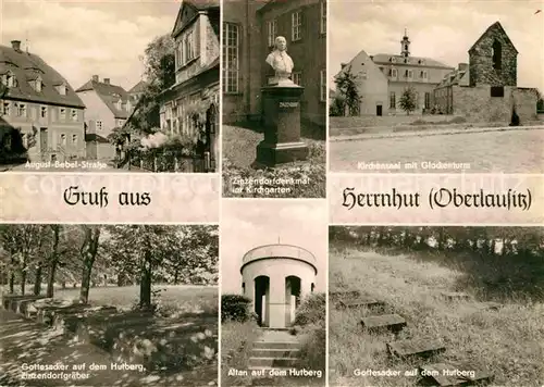 AK / Ansichtskarte Herrnhut August Bebel Strasse Zinzendorfdenkmal im Kirchgarten Gottesacker Hutberg Kirchensaal mit Glockenturm Kat. Herrnhut