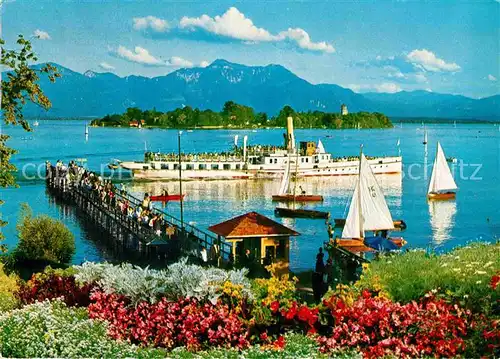 AK / Ansichtskarte Prien Chiemsee Fraueninsel im Chiemsee mit Hochfelln und Hochgern Chiemgauer Alpen Bootsanleger Ausflugsdampfer Kat. Prien a.Chiemsee