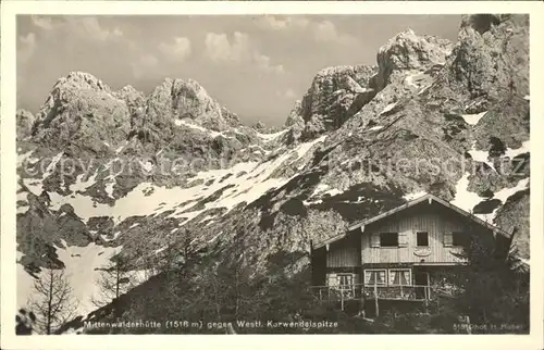 AK / Ansichtskarte Mittenwald Karwendel Tirol Mittenwalderhuette mit Karwendelspitze Kat. Schwaz