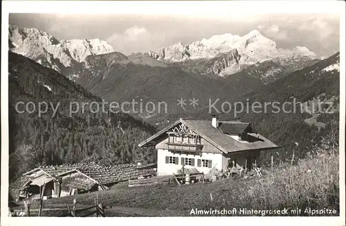 AK / Ansichtskarte Garmisch Partenkirchen Almwirtschaft Hintergraseck mit Alpspitze Kat. Garmisch Partenkirchen
