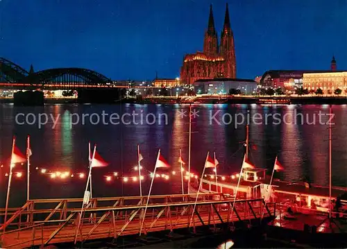 AK / Ansichtskarte Koeln Rhein Rheinufer mit Dom und Hohenzollernbruecke Kat. Koeln