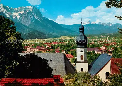 AK / Ansichtskarte Garmisch Partenkirchen Kirche Panorama Blick zum Waxenstein und Zugspitze Wettersteingebirge Kat. Garmisch Partenkirchen