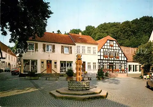 AK / Ansichtskarte Tecklenburg Marktplatz Brunnen Fachwerkhaus Kat. Tecklenburg