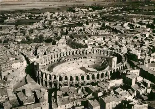 AK / Ansichtskarte Arles Bouches du Rhone Vue aerienne sur les Arenes Kat. Arles