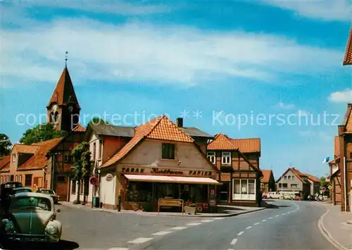 AK / Ansichtskarte Dahlenburg Hauptstrasse Ladengeschaeft Kirchturm Kat. Dahlenburg