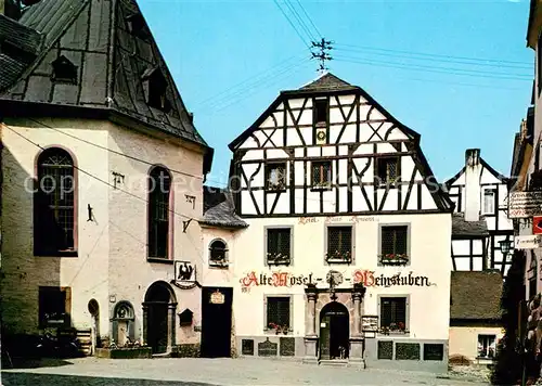 AK / Ansichtskarte Beilstein Mosel Marktplatz Alte Pfarrkirche Weinstuben Fachwerkhaus Altstadt Kat. Beilstein