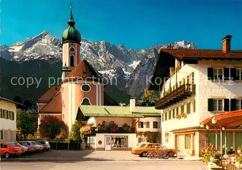 AK / Ansichtskarte Garmisch Partenkirchen Mohrenplatz Pfarrkirche St Martin Zugspitzmassiv Wettersteingebirge Kat. Garmisch Partenkirchen