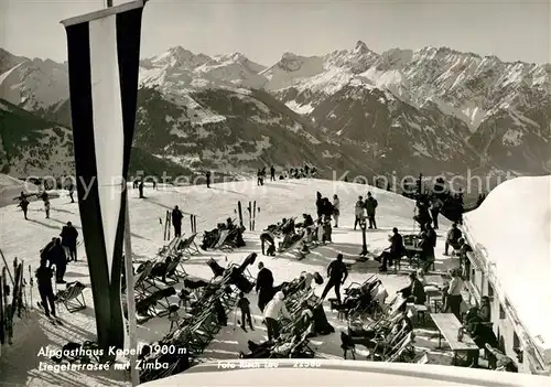 AK / Ansichtskarte Schruns Vorarlberg Alpengasthaus Kapell Liegeterrasse mit Zimba Wintersportplatz Alpen Fahne Kat. Schruns