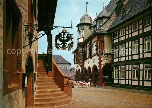 AK / Ansichtskarte Goslar Rathaustreppe Tuerschild Hotel Fachwerkhaus Kat. Goslar