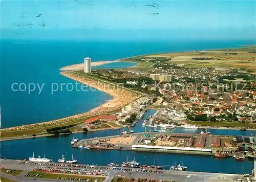 AK / Ansichtskarte Buesum Nordseebad Fliegeraufnahme mit Hafen Strand Kat. Buesum