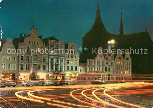 AK / Ansichtskarte Rostock Mecklenburg Vorpommern Ernst Thaelmann Platz bei Nacht Kat. Rostock