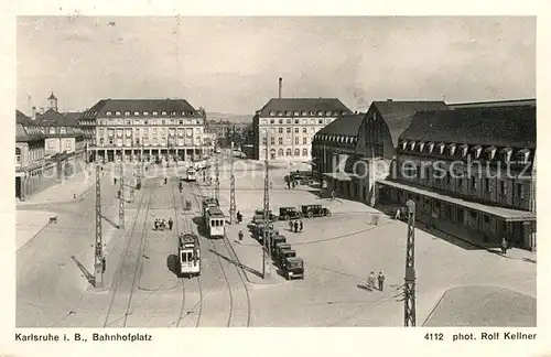 AK / Ansichtskarte Karlsruhe Baden Bahnhofsplatz Strassenbahn