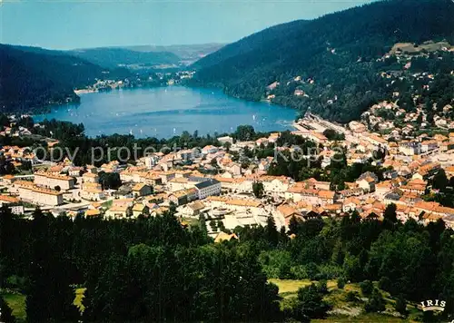 AK / Ansichtskarte Gerardmer Vosges La ville et le lac dans leur ecrin de verdure vue aerienne Kat. Gerardmer