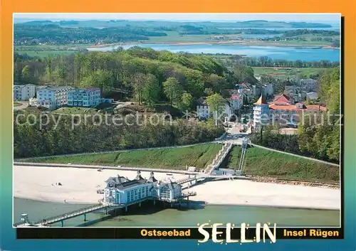 AK / Ansichtskarte Sellin Ruegen Fliegeraufnahme mit Strand und Seebruecke Kat. Sellin Ostseebad