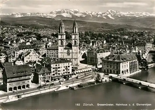 AK / Ansichtskarte Zuerich ZH Grossmuenster Helmhaus Limmat Glarneralpen Fliegeraufnahme