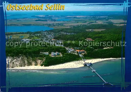 AK / Ansichtskarte Sellin Ruegen Fliegeraufnahme mit Seebruecke und Strand Kat. Sellin Ostseebad