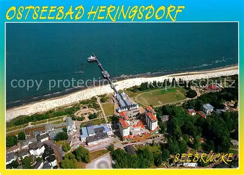 AK / Ansichtskarte Heringsdorf Ostseebad Usedom Fliegeraufnahme mit Strand Seebruecke Kat. Heringsdorf